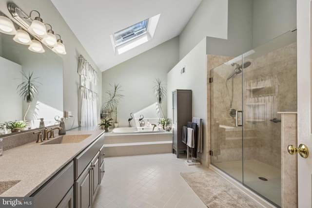 1043 Welsh Ayres Way, Downingtown, PA 19335 - bathroom featuring lofted ceiling, a skylight, a bath, double vanity, and a shower stall