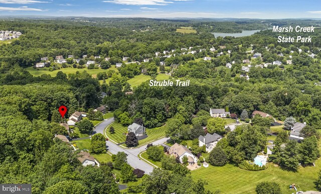 1043 Welsh Ayres Way, Downingtown, PA 19335 - drone / aerial view of a heavily wooded area and a large body of water