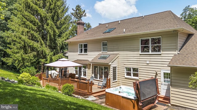 1043 Welsh Ayres Way, Downingtown, PA 19335 - rear view of property with a hot tub, a wooden deck, a chimney, roof with shingles, and a gazebo