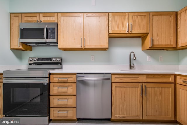 15115 Interlachen Dr Unit 3-1020, Silver Spring, MD 20906 - kitchen with stainless steel appliances and light countertops