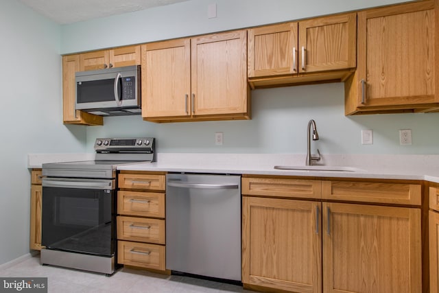 15115 Interlachen Dr Unit 3-1020, Silver Spring, MD 20906 - kitchen featuring stainless steel appliances and light countertops