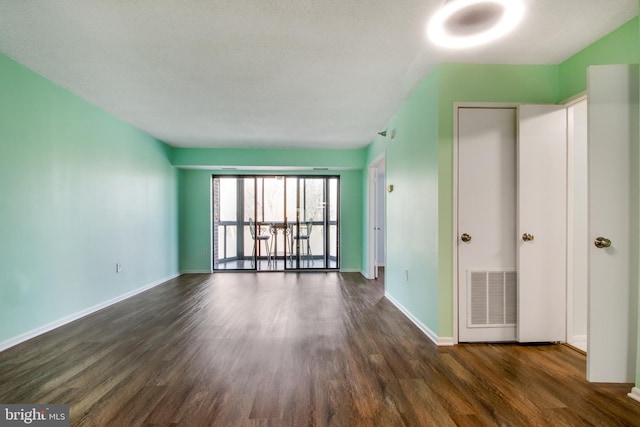 15115 Interlachen Dr Unit 3-1020, Silver Spring, MD 20906 - empty room featuring wood finished floors and baseboards