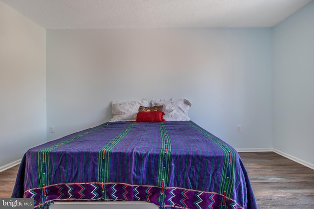 15115 Interlachen Dr Unit 3-1020, Silver Spring, MD 20906 - bedroom featuring wood finished floors and baseboards