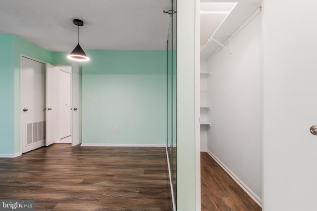 15115 Interlachen Dr Unit 3-1020, Silver Spring, MD 20906 - unfurnished bedroom with wood finished floors and baseboards