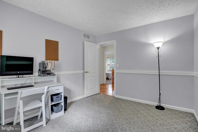 207 Weston Woods Dr, Pasadena, MD 21122 - carpeted home office with baseboards and a textured ceiling
