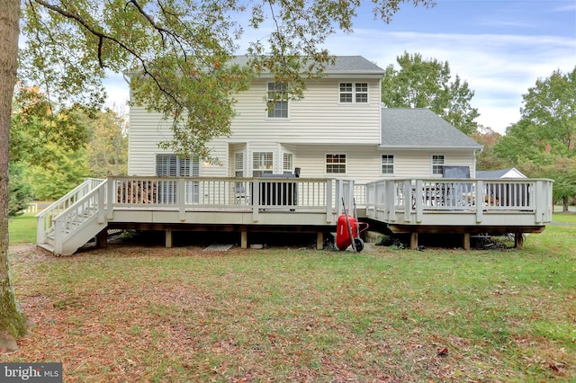 207 Weston Woods Dr, Pasadena, MD 21122 - rear view of property featuring a lawn and a wooden deck