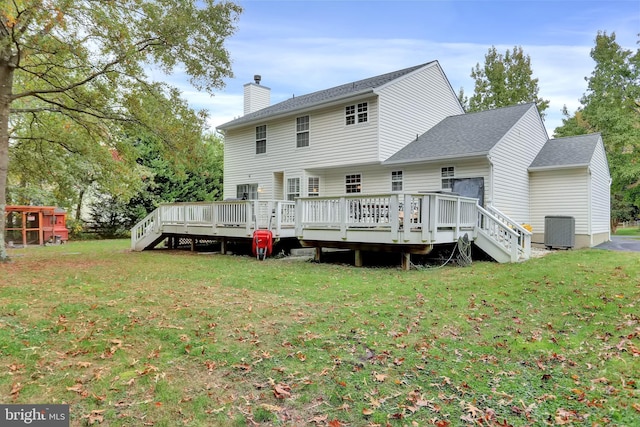 207 Weston Woods Dr, Pasadena, MD 21122 - rear view of property with a chimney, a lawn, a deck, and roof with shingles