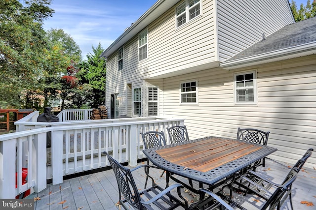 207 Weston Woods Dr, Pasadena, MD 21122 - wooden deck with outdoor dining space