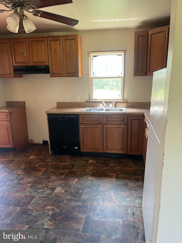 472 Lummistown Rd, Cedarville, NJ 08311 - kitchen featuring dishwasher, under cabinet range hood, stone finish flooring, and brown cabinetry