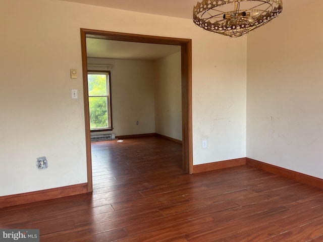 472 Lummistown Rd, Cedarville, NJ 08311 - empty room with hardwood / wood-style flooring and a chandelier