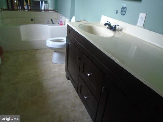 472 Lummistown Rd, Cedarville, NJ 08311 - full bath with a garden tub, tile patterned floors, and vanity