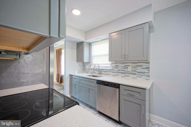 16 Franklin Dr, Voorhees, NJ 08043 - kitchen with dishwasher, gray cabinets, range, tasteful backsplash, and light countertops