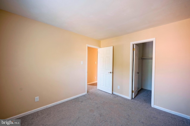 16 Franklin Dr, Voorhees, NJ 08043 - unfurnished bedroom featuring carpet, a spacious closet, and a closet