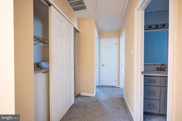 16 Franklin Dr, Voorhees, NJ 08043 - corridor featuring washer / dryer, carpet, and attic access