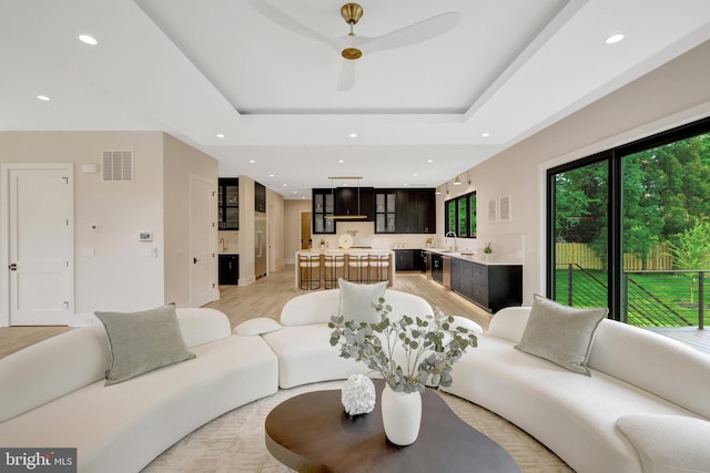 1710 Fairview Ave, Mclean, VA 22101 - living area featuring light wood-style floors, recessed lighting, a tray ceiling, and ceiling fan