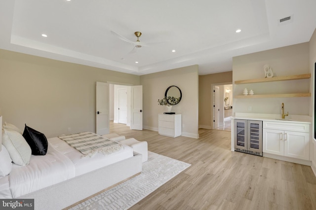 1710 Fairview Ave, Mclean, VA 22101 - bedroom featuring beverage cooler, a raised ceiling, bar with sink, and recessed lighting