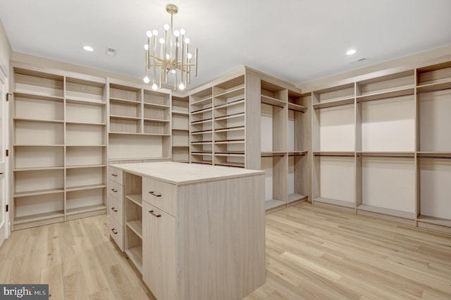 1710 Fairview Ave, Mclean, VA 22101 - spacious closet featuring light wood finished floors and a chandelier