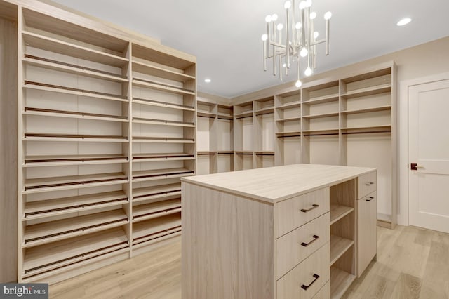 1710 Fairview Ave, Mclean, VA 22101 - spacious closet with light wood-style floors and a chandelier