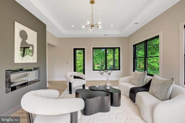1710 Fairview Ave, Mclean, VA 22101 - living area featuring a chandelier, a raised ceiling, light wood-style floors, and recessed lighting