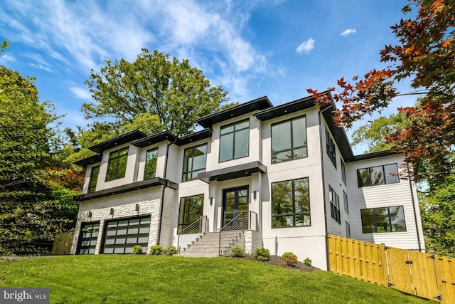 1710 Fairview Ave, Mclean, VA 22101 - contemporary house featuring a garage, stucco siding, and stone siding