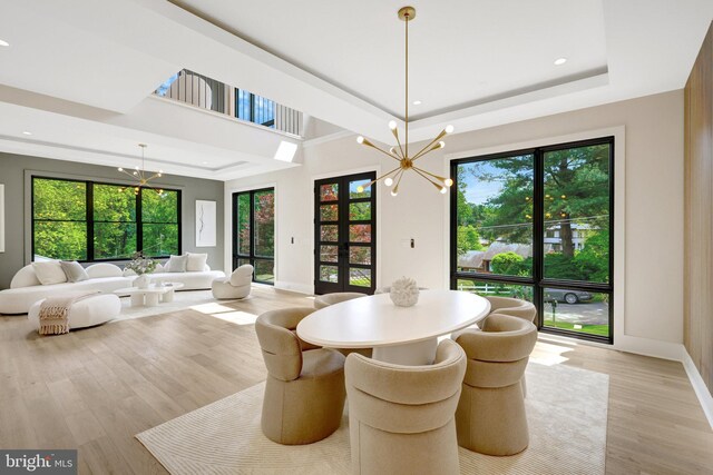 1710 Fairview Ave, Mclean, VA 22101 - dining room featuring a chandelier, french doors, a raised ceiling, light wood finished floors, and recessed lighting