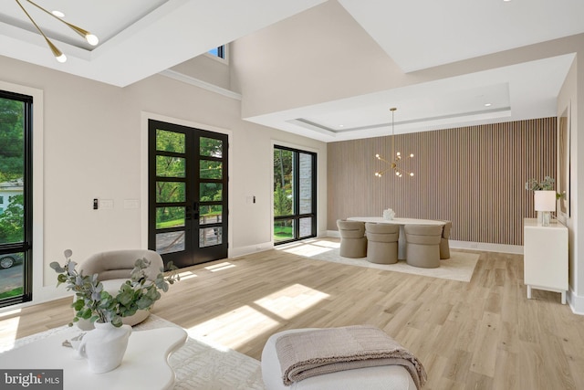 1710 Fairview Ave, Mclean, VA 22101 - living area featuring a raised ceiling, a chandelier, french doors, light wood-style flooring, and recessed lighting