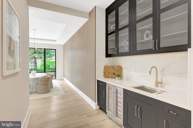 1710 Fairview Ave, Mclean, VA 22101 - bar with wine cooler, light wood-style floors, backsplash, and pendant lighting