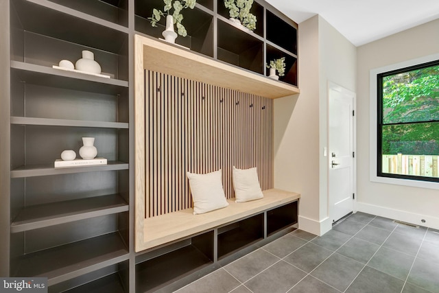 1710 Fairview Ave, Mclean, VA 22101 - mudroom featuring dark tile patterned flooring and baseboards