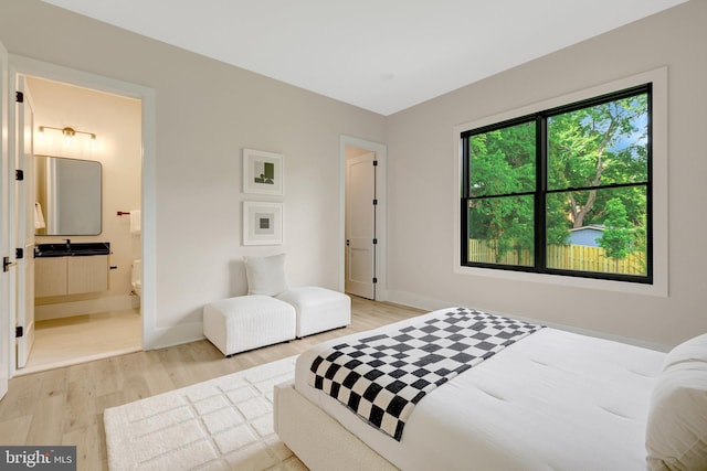 1710 Fairview Ave, Mclean, VA 22101 - bedroom featuring light wood finished floors and ensuite bath