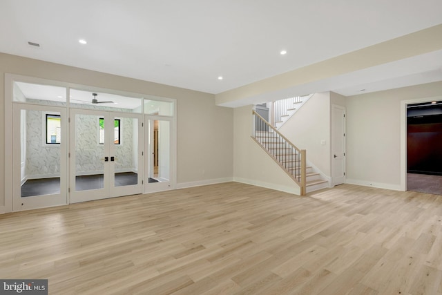 1710 Fairview Ave, Mclean, VA 22101 - unfurnished living room featuring stairs, light wood finished floors, a ceiling fan, recessed lighting, and french doors