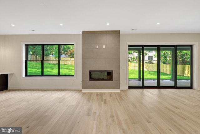 1710 Fairview Ave, Mclean, VA 22101 - unfurnished living room featuring wood finished floors, plenty of natural light, a fireplace, and recessed lighting