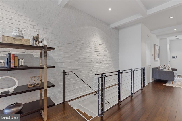 2223 1st St NW Unit 1, Washington, DC 20001 - hall with an upstairs landing, hardwood / wood-style floors, beamed ceiling, recessed lighting, and brick wall