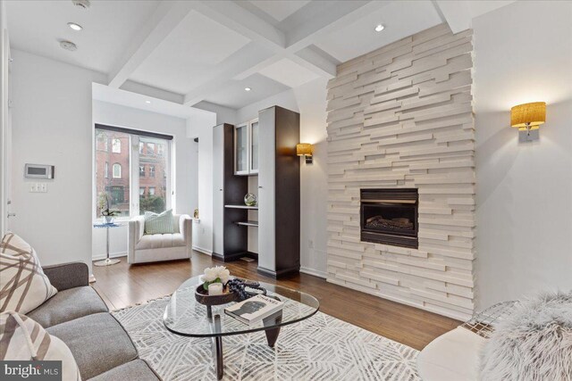 2223 1st St NW Unit 1, Washington, DC 20001 - living room with wood finished floors, beamed ceiling, coffered ceiling, a large fireplace, and recessed lighting