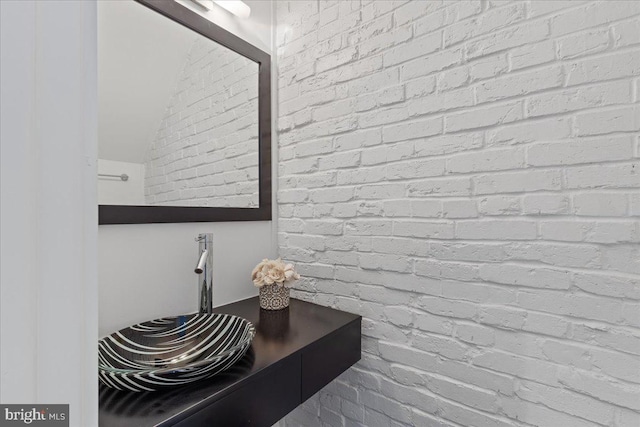 2223 1st St NW Unit 1, Washington, DC 20001 - bathroom featuring brick wall