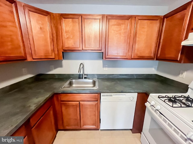 104 Falcon Ridge Way Unit Bldg10 Unit4, Hamburg, NJ 07419 - kitchen with white appliances, dark countertops, brown cabinets, and under cabinet range hood