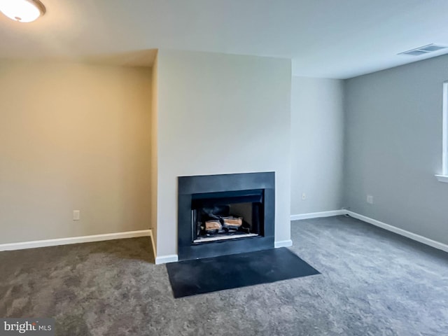 104 Falcon Ridge Way Unit Bldg10 Unit4, Hamburg, NJ 07419 - unfurnished living room featuring carpet flooring and a fireplace with flush hearth