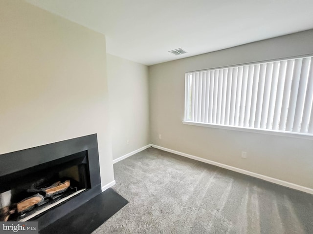 104 Falcon Ridge Way Unit Bldg10 Unit4, Hamburg, NJ 07419 - unfurnished living room with carpet and a fireplace with flush hearth
