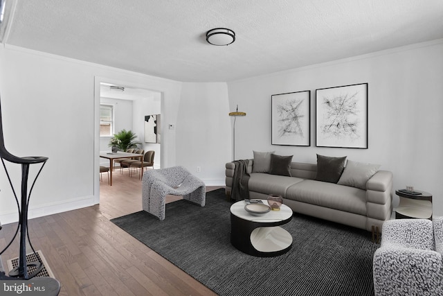 6333 Mershon St, Philadelphia, PA 19149 - living room featuring dark wood finished floors and a textured ceiling