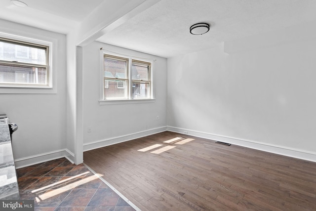 6333 Mershon St, Philadelphia, PA 19149 - spare room featuring healthy amount of natural light and wood finished floors