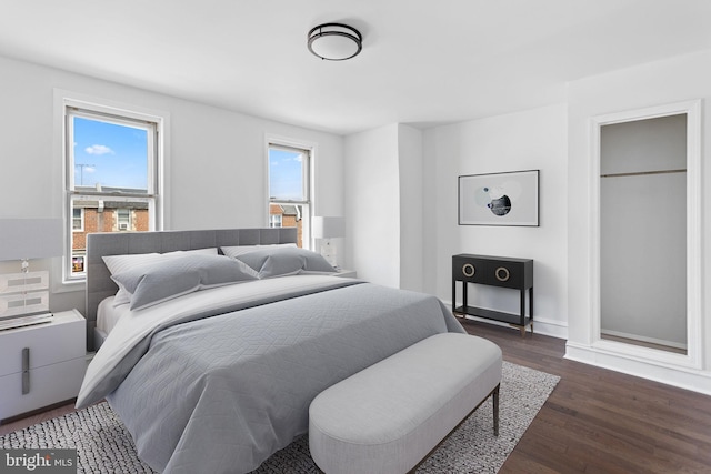 6333 Mershon St, Philadelphia, PA 19149 - bedroom with dark wood-type flooring and multiple windows