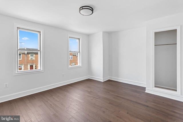 6333 Mershon St, Philadelphia, PA 19149 - unfurnished bedroom with dark wood-style floors and baseboards