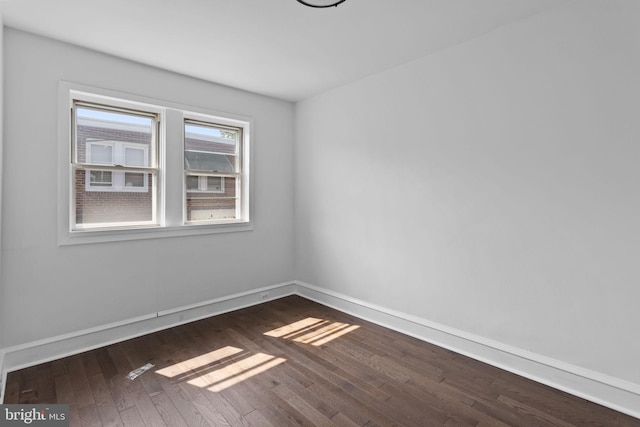 6333 Mershon St, Philadelphia, PA 19149 - spare room with dark wood finished floors and baseboards