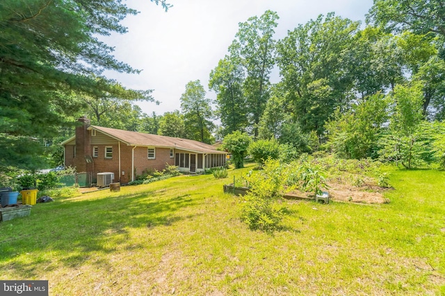 892 Timber Ridge Dr, Hanover, MD 21076 - view of grassy yard featuring a garden