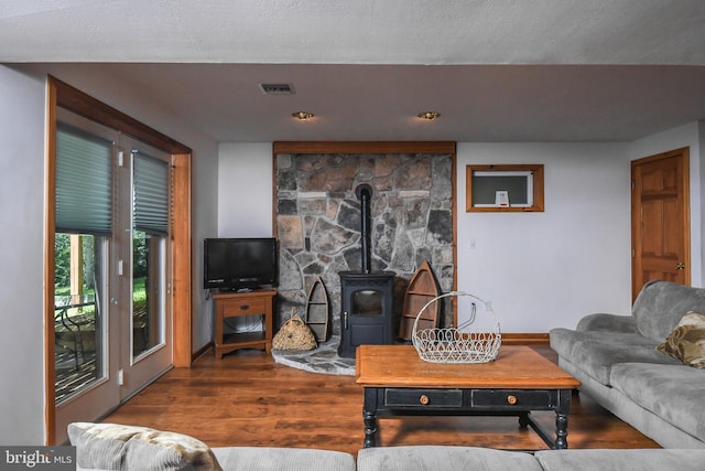 1140 Rock Lodge Rd, Mc Henry, MD 21541 - living area featuring wood finished floors and a wood stove