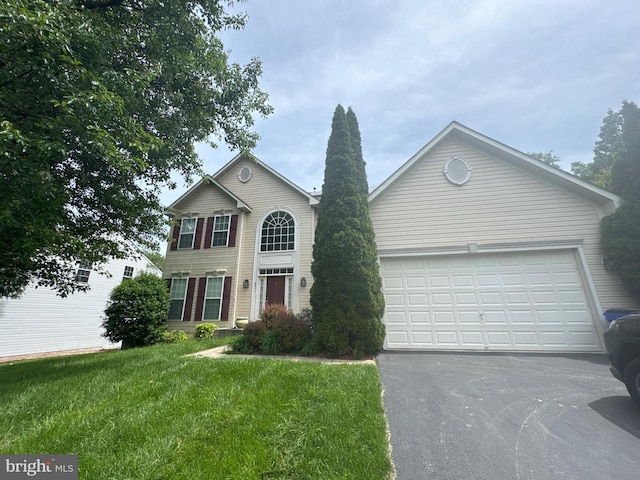 8511 Horseshoe Rd, Ellicott City, MD 21043 - view of front facade with driveway, a front lawn, and an attached garage