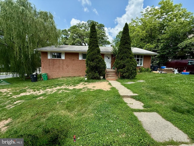 6010 Ravenswood Rd, Riverdale, MD 20737 - ranch-style home featuring brick siding and a front yard
