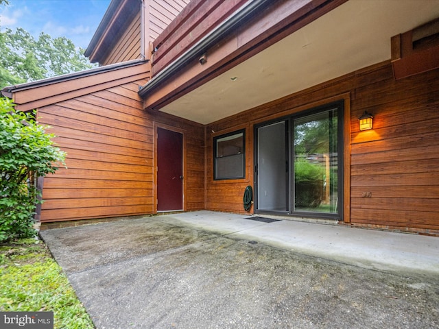 7607 Weather Worn Way Unit A, Columbia, MD 21046 - view of exterior entry featuring a patio area