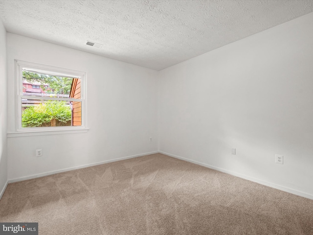 7607 Weather Worn Way Unit A, Columbia, MD 21046 - empty room featuring carpet and a textured ceiling