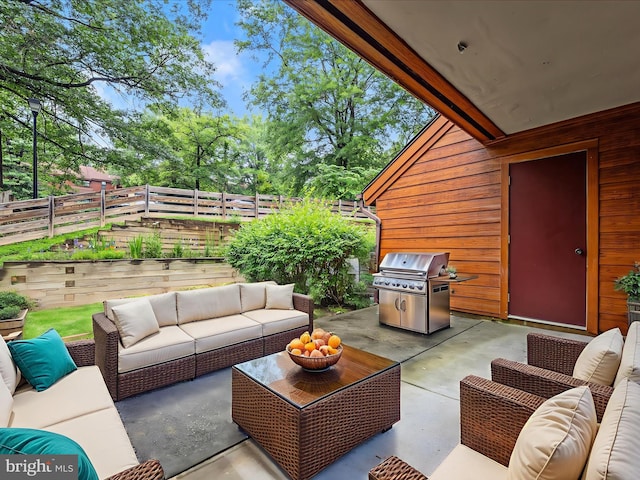 7607 Weather Worn Way Unit A, Columbia, MD 21046 - fenced backyard with a grill, an outdoor living space, and a patio