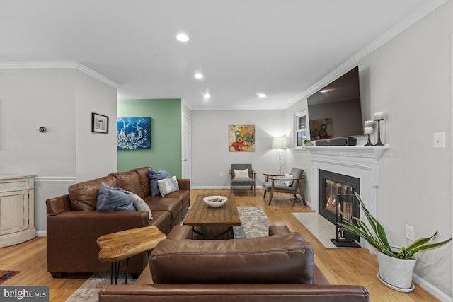 10034 Park Woods Ln, Burke, VA 22015 - living room with a fireplace with flush hearth, recessed lighting, wood finished floors, and ornamental molding